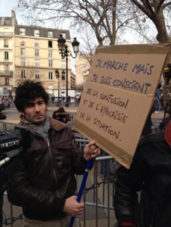 "I’m marching but I’m conscious of the hypocrisy and confusion of the situation." - An image from the march in Paris widely shared on social media. 